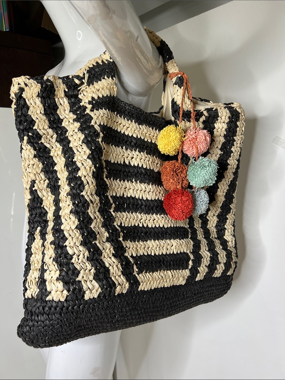Billabong "Talk to The Palm" tote bag features a black and cream striped design